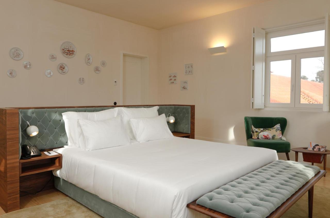Montebelo Vista Alegre Ilhavo Hotel المظهر الخارجي الصورة A bedroom at the hotel