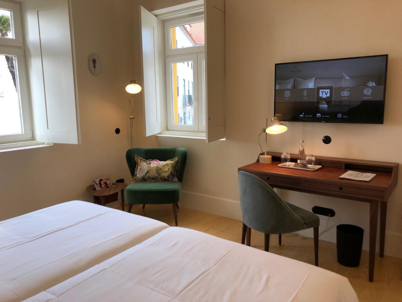 Montebelo Vista Alegre Ilhavo Hotel المظهر الخارجي الصورة A room at the hotel